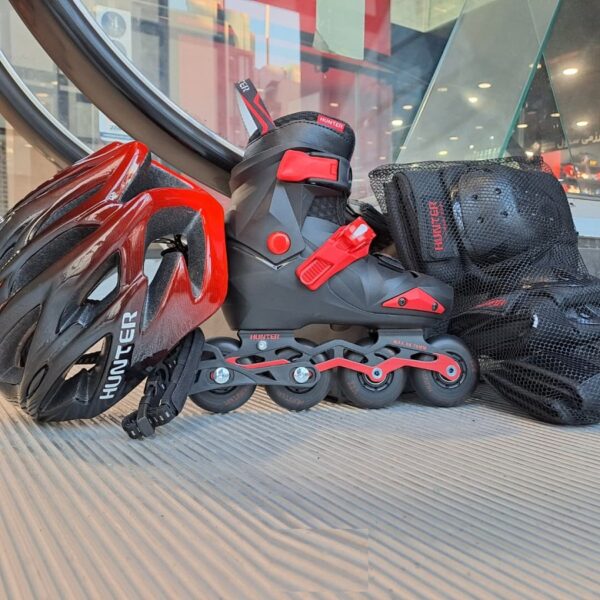کفش اسکیت بچگانه متغیر فلزی هانتر مشکی قرمز Hunter + لوازم